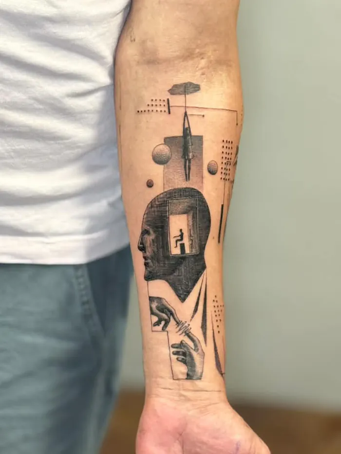 Fine line forearm tattoo of a surreal profile portrait with geometric elements, black and grey by Duk Tattoo, Boca Raton, Florida