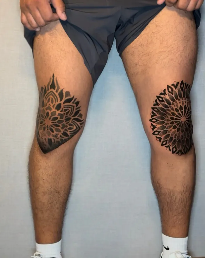 Geometric tattoo of a pair of dotwork mandalas on both knees by Duk Tattoo, Boca Raton, Florida