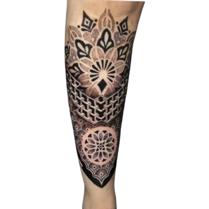 Geometric mandala shin tattoo with stacked sacred geometry patterns in blackwork by Duk Tattoo, Boca Raton